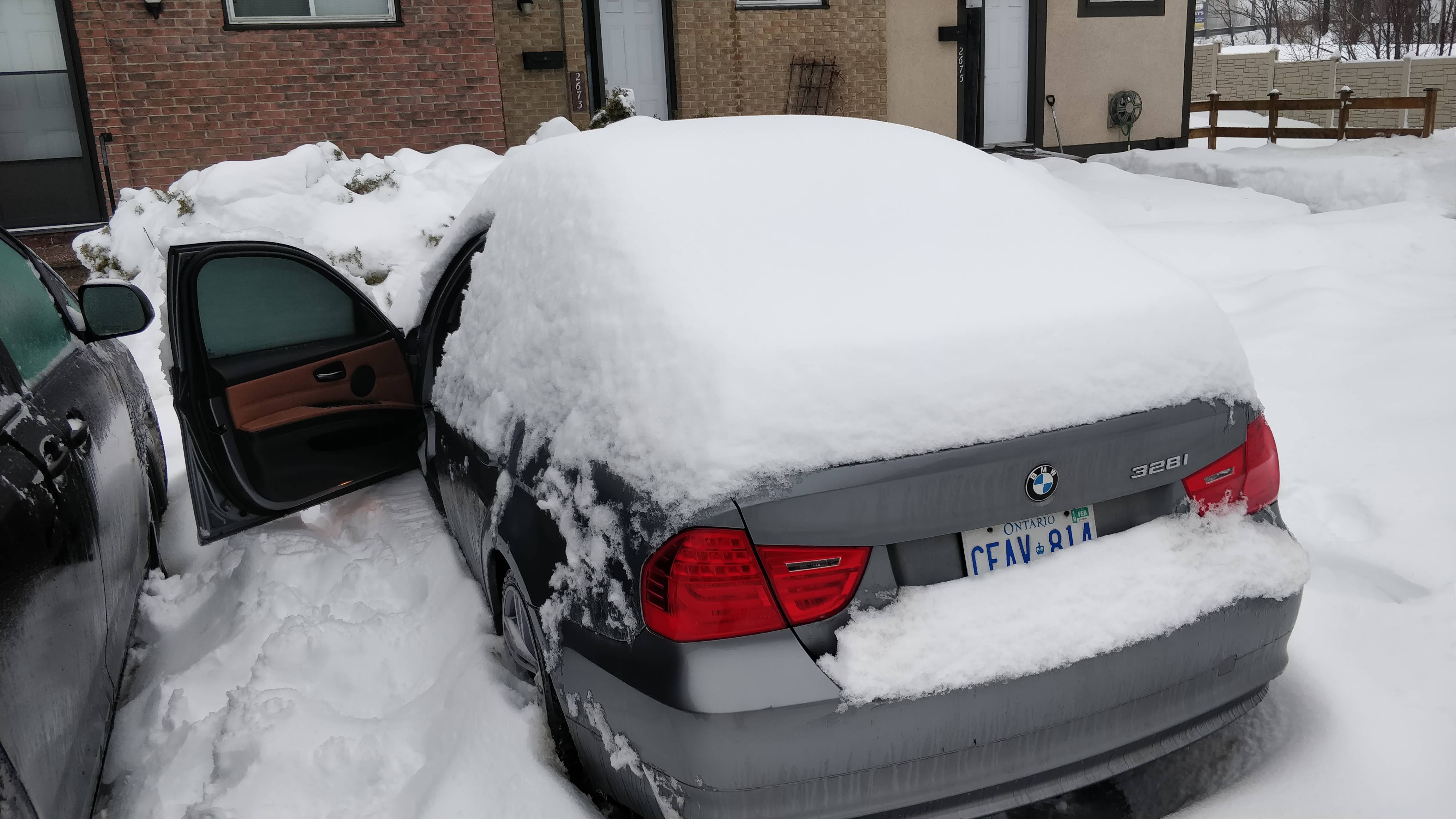 Car in a foot of snow