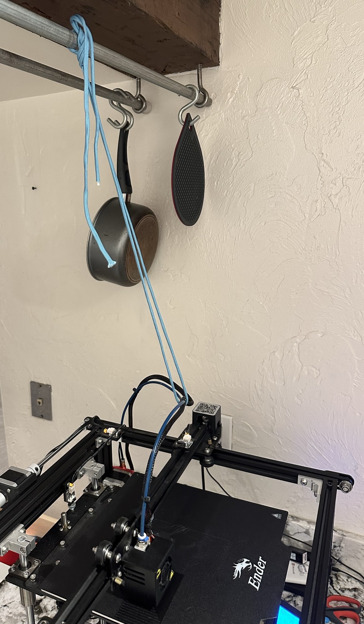 3D printer hose being suspended